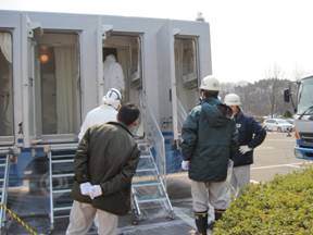 a photo of dispatched vehicle carrying showers that was located at Fukushima Medical University
